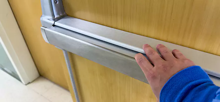 Installing a Push Bar on a Door Delson